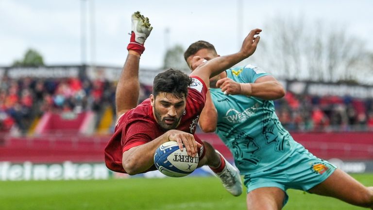 An airborne Damian de Allende goes over to score the match-clinching try in Limerick